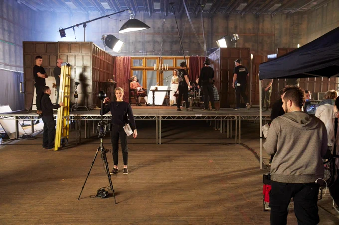 Behind the scenes of a film set. 