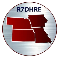 Logo of Region 7 Disaster Health Response Ecosystem (R7DHRE), showing a metallic circular badge with red outlines of Iowa, Kansas, Missouri, and Nebraska on a silver background, with “R7DHRE” at the top.