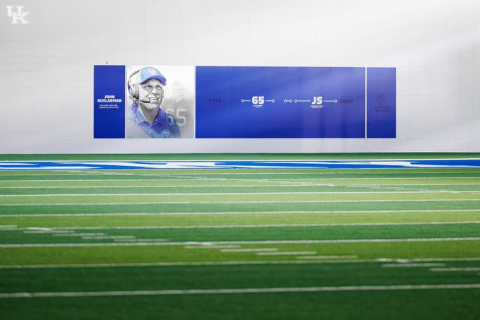 John Schlarman memorial banner in Nutter Practice Facility. 