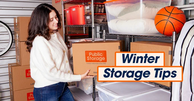 Woman organizing boxes in a Public Storage unit, with a headline on the graphic reading 'Winter Storage Tips'.
