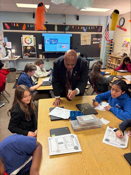 Dr. Yearwood working with students.