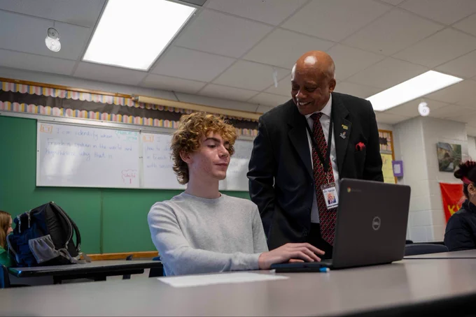 Dr. Yearwood and a student.