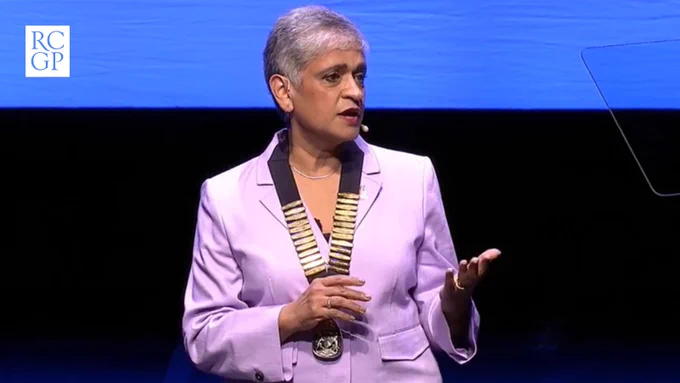 A photo of Chair Professor Kamila Hawthorne speaking at Annual Conference