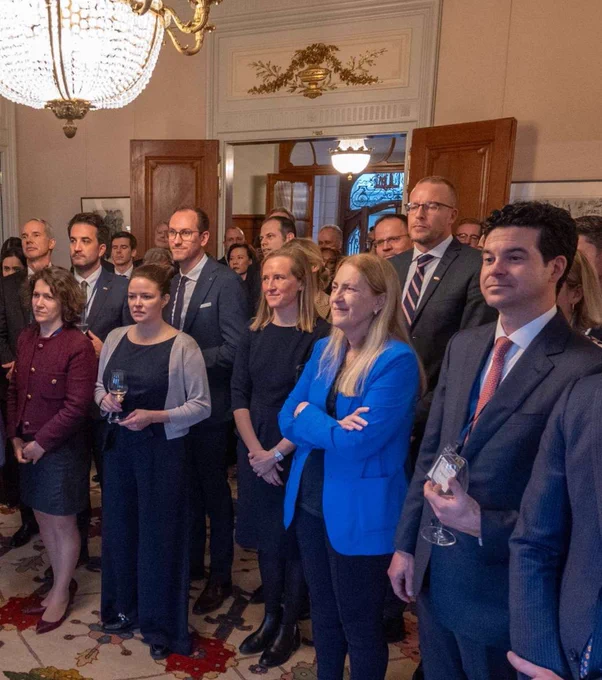 Guests from the American Swiss Foundation listen attentively during a reception hosted by Ambassador Callista L. Gingrich, with State Secretary Helene Budliger Artieda among the attendees.
