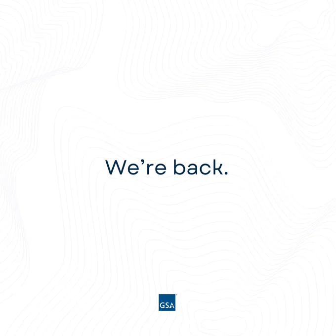 White background with subtle contour lines. Centered dark blue text reads: “We’re back.” A small blue GSA logo appears at the bottom.