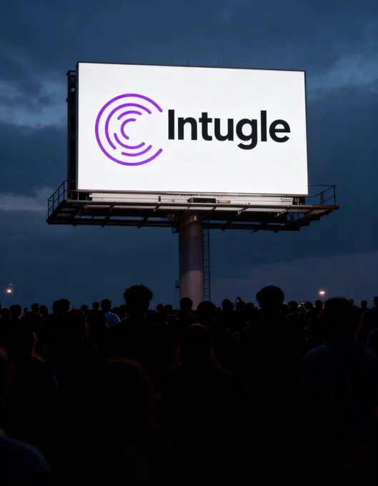 Billboard of Intugle Logo, Sillhouette of a crowd looking up at it.