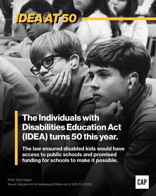 A black and white photograph of two young boys, one wearing glasses, sitting and listening attentively in a classroom setting. A yellow banner across the top reads "IDEA AT 50". Text is overlaid on the bottom half of the image: "The Individuals with Disabilities Education Act (IDEA) turns 50 this year. The law ensured disabled kids would have access to public schools and promised funding for schools to make it possible." The source is cited at the bottom.