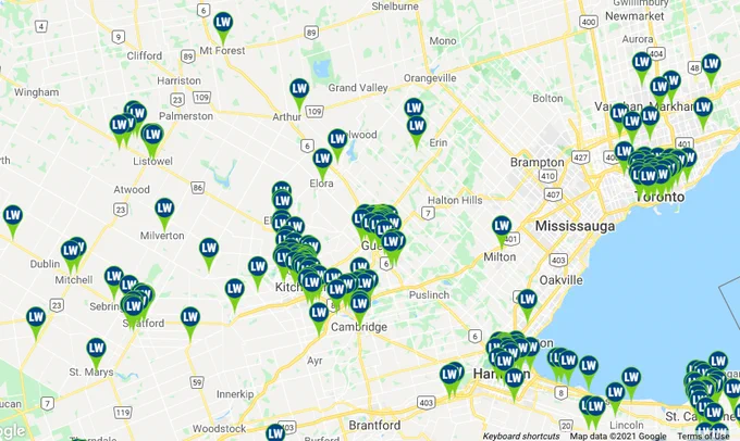 Image of a map of Southern Ontario with green, blue, and white location pins to signify the locations of Living Wage employers.