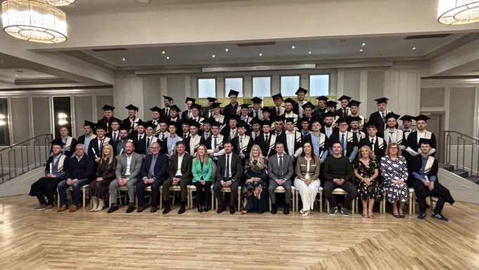 Markets group of graduates and guests.