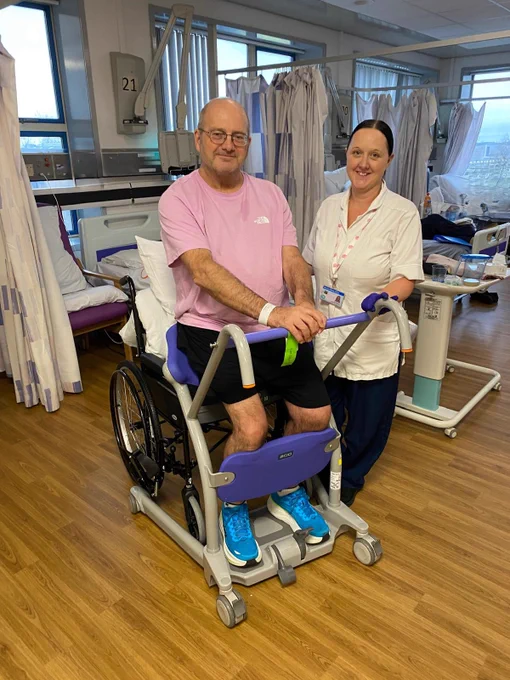 Therapist helping patient to transfer with Sara Steady.
