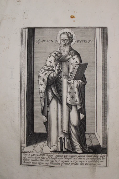 The bishop hold a book. He wears clerical costume which has lots of crosses sewn on to it. His right hand is raised to give a blessing. he has a beard and a halo is drawn behind his head by the engraver.