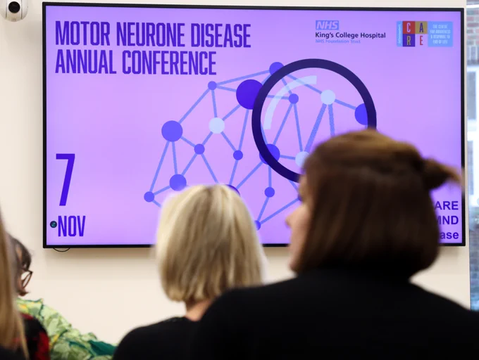 Attendees viewing a presentation screen at the Motor Neurone Disease Annual Conference on November 7.