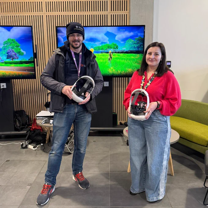 Someone showing the Accommodation and Student Village VR headset