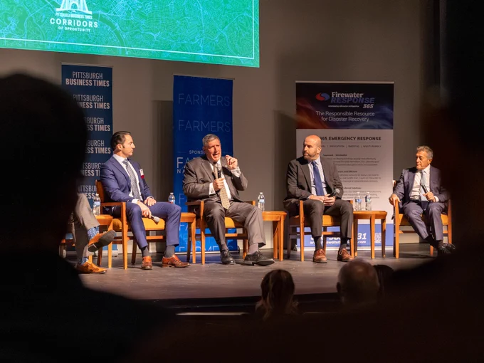 President Chris Brussalis on stage with Pittsburgh leaders at the Corridors event hosted in the Pittsburgh Playhouse