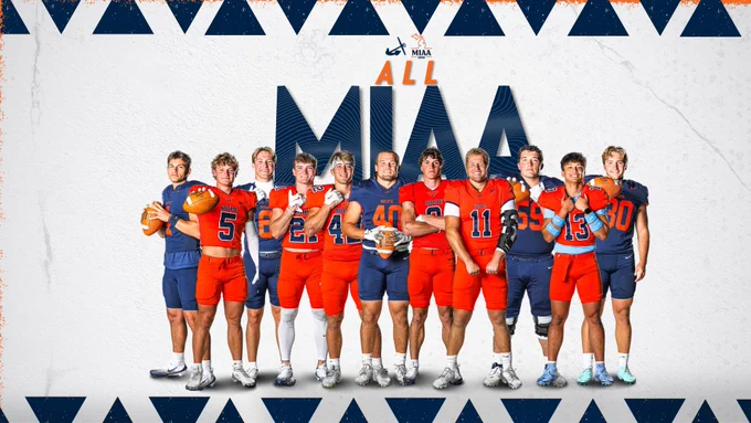 Eleven Hope football players pose for portraits.