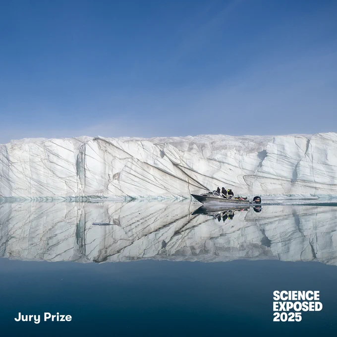 IMAGE: "Small boats, big glaciers" by Patrick White, Dalhousie University.  This image shows one such glacier behind a boat owned and operated by Ausuittuq Adventures.