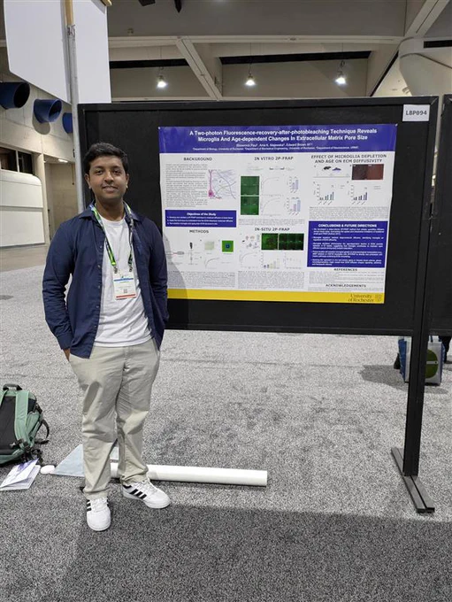 Person presenting research poster