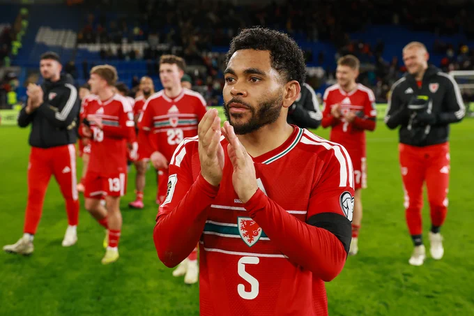Jay Dasilva celebrates Cymru's 7-1 win over North Macedonia.