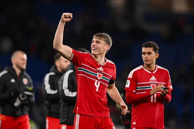 Dylan Lawlor celebrates Cymru's 7-1 win over North Macedonia.