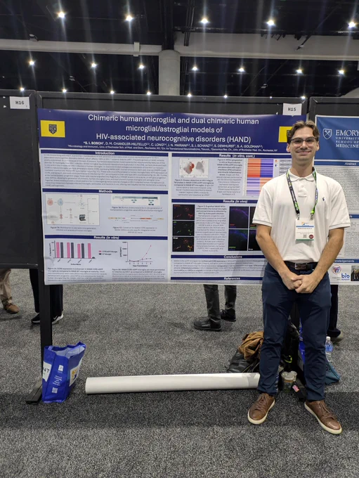 student with scientific poster