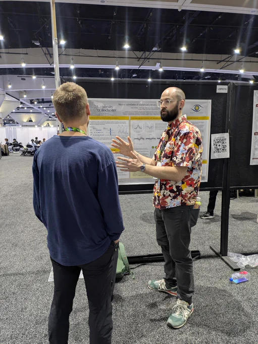 postdoc presenting scientific poster
