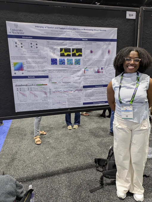 Student presenting scientific poster