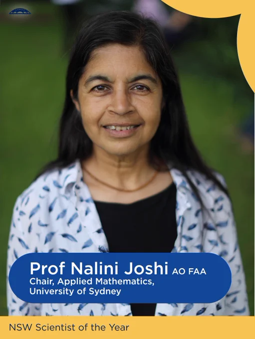 Portrait of Prof Nalini Joshi, Chair of Applied Mathematics at the University of Sydney and NSW Scientist of the Year, smiling against a blurred natural background.