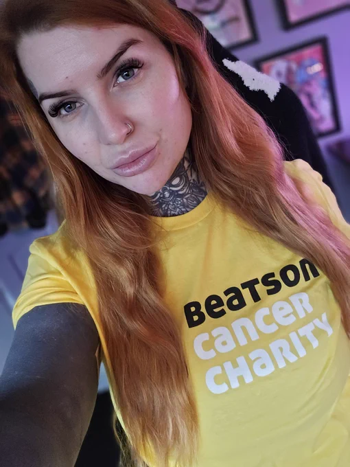 Selfie of Kirsti in a yellow Beatson Cancer Charity tshirt