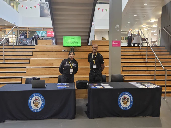 Two members of the recruitment team standing together and BCU