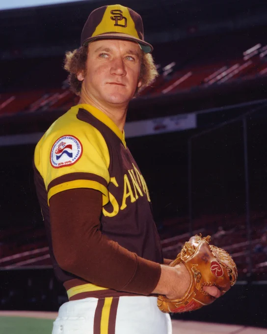 Posed portrait of Randy Jones in a brown San Diego uniform with a National League centennial patch on his right sleeve. (Doug McWilliams/National Baseball Hall of Fame and Museum)