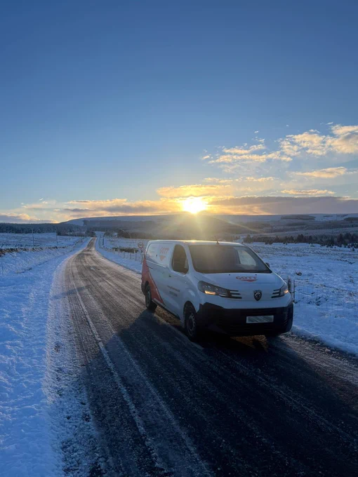 A Gott Technical Services van travelling in the snow in the Scottish Borders