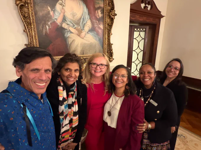 Selfie of Dr. Rao with his wife Monica and four additional smiling women.