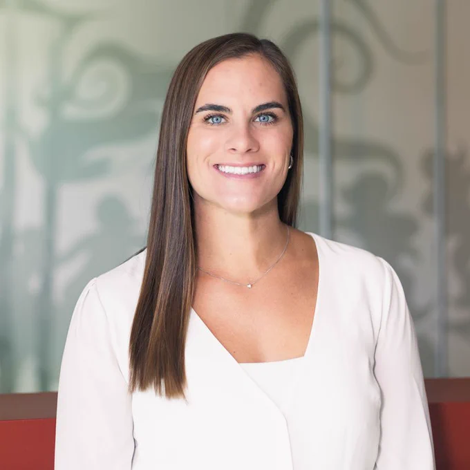 A portrait of Cara Nania, University of Calgary PhD Student and ENHANCE Lab researcher, whose work examines the pain experiences of youth with Fetal Alcohol Spectrum Disorder (FASD), and how these experiences impact mental health.