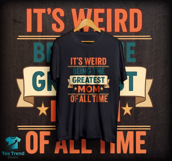 Featuring bold, vintage-inspired typography in warm, cheerful colors, this tee makes the perfect gift for moms who take pride in being the best. Celebrate motherhood with humor and style with this “It’s Weird Being the Greatest Mom of All Time” T-shirt. Ideal for Mother’s Day, birthdays, or everyday wear to show off your supermom status!