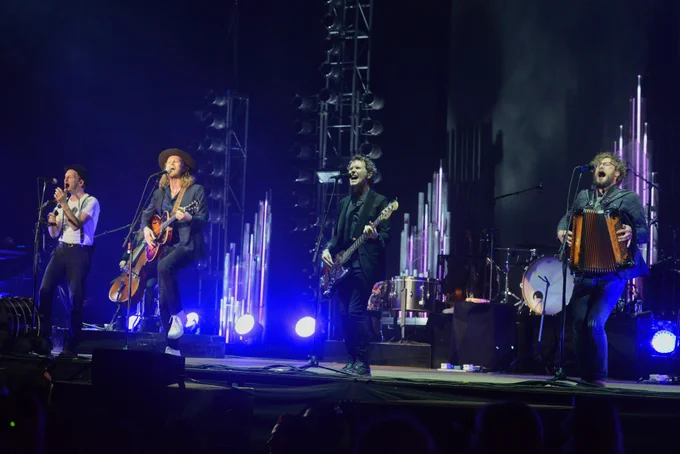 The Lumineers perform on stage.