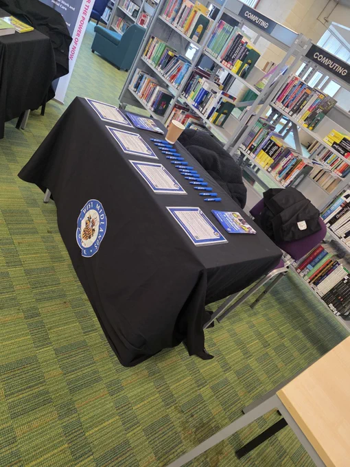 Table set up at Rugby with pens and leaflets on it
