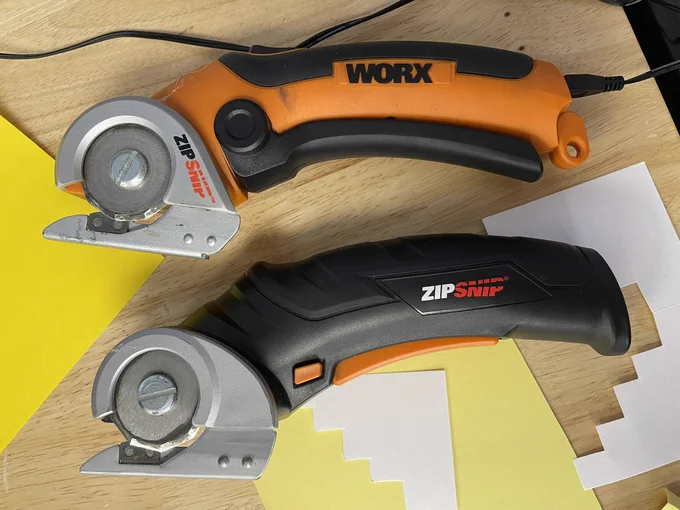 Two cardboard saws.