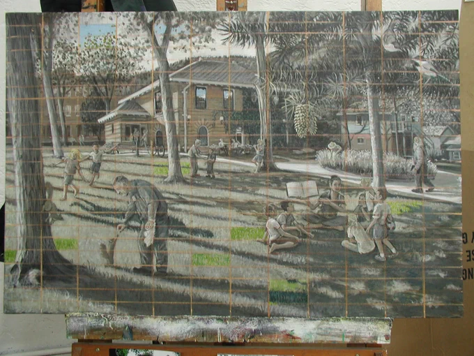 a closeup of the painting, which depicts Manitou Springs Library and people playing outside on the front lawn. A man feeds a squirrel, a group of young people listen to someone read them a book, another group of people run around, someone walks by with a book, and other groups enjoy the space. The painting has a grid drawn on it, and some squares of the grid are now in vibrant paint colors.