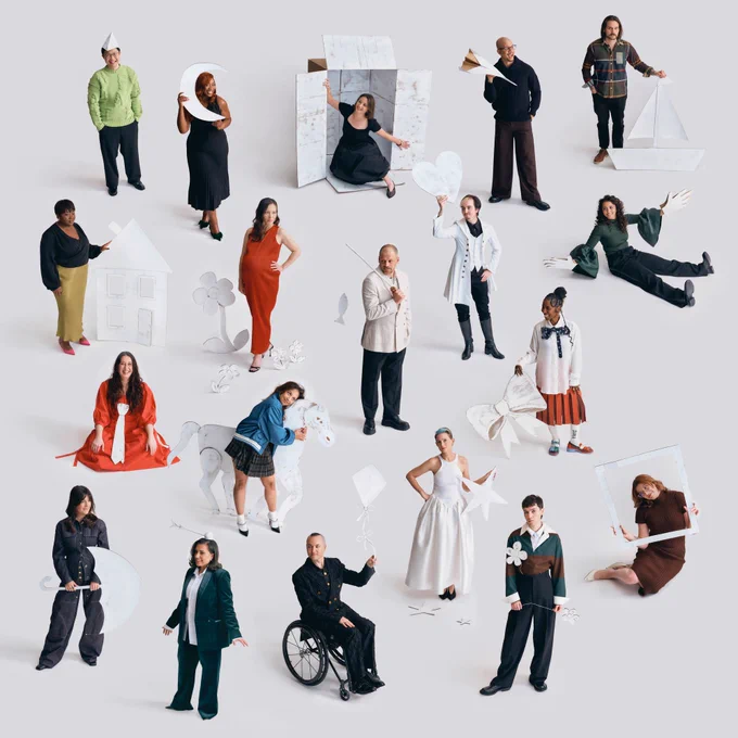An aerial view image of our 2025 BAFTA Breakthrough cohort. They are all interacting with giant whot cardboard props.