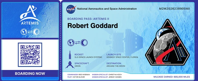 A rectangular blue boarding pass for the Artemis II lunar mission. The smaller, left side which would normally be torn off a ticket, has a QR code and the Artemis logo and says Boarding Now. The larger right side is a lighter blue. It has the NASA logo and says Boarding Pass Artemis II. Below that, the name Robert Goddard is printed in black. Various blueprint-style graphics decorate the pass, with a cratered lunar background. The Artemis II patch is on the far right side. 