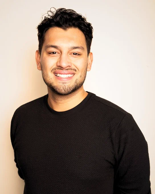 A portrait of ENHANCE Lab researcher and University of Calgary PhD Student, Hangsel Sanguino. Hangsel’s research focuses on the contributing factors that impact Autistic youth mental health.