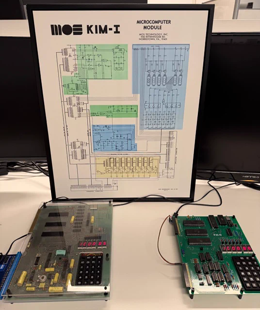 An original KIM-1 single board computer system, and a "modern" remake. The KIM-1 was a trainer / dev board for thed 6502 from 1976.