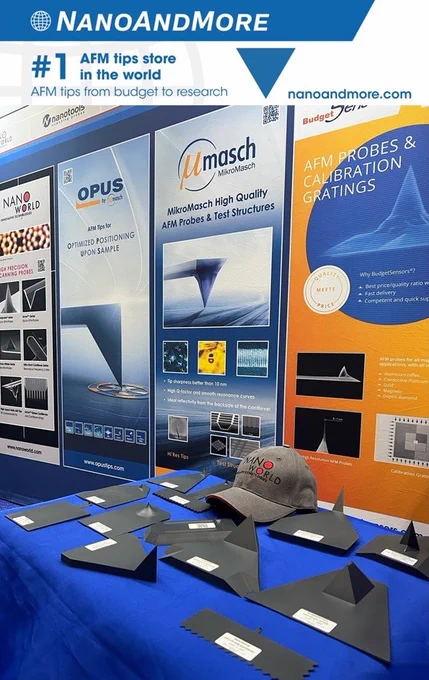 NanoAndMore AFM probes logo on the top with an image of a NanoAndMore AFMtips exhibition booth 