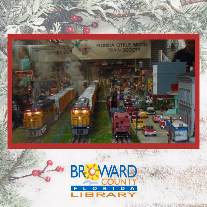 Image of a detailed model train display created by the Florida Citrus Model Train Society. The photo is framed by a snowy, holiday design and includes the Broward County Library logo.