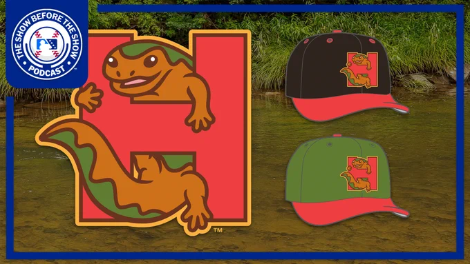 The fake logo and hats for the Huntington Hellbenders, a team we created for the Minor League Baseball podcast. The main logo features a brown-and-green salamander wrapped around a pink-red letter H. The hats are in black and green, both with pink-red brims. The logo for The Show Before the Show appears in the top-left corner.