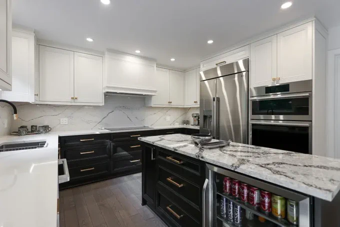 LUXURY CUSTOM KITCHEN REMODEL IN THE GTA🍽️🔨✨

Transform your home with this stunning custom two-tone kitchen! 😍 Solid wood cabinets painted in elegant off-white and stained in rich charcoal bring the perfect balance of modern style and timeless craftsmanship. Designed & built with precision by Joseph Kitchen and Bath, this remodel elevates functionality and beauty in every corner. 🍽️💎
