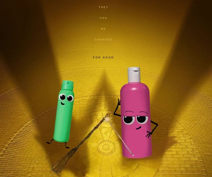 A cartoon green aerosol deodorant can and pink shampoo bottle with expressive doodled features stand next to each other on a yellow brick road background - the poster for the Wicked movie. The pink shampoo bottle poses as "Glinda the Good Witch" from Wicked and has a pink magic wand. The green aerosol can poses as "The Wicked Witch of the West" or "Elphaba" from the movie Wicked. Text above reads 'They can be changed for good.'
