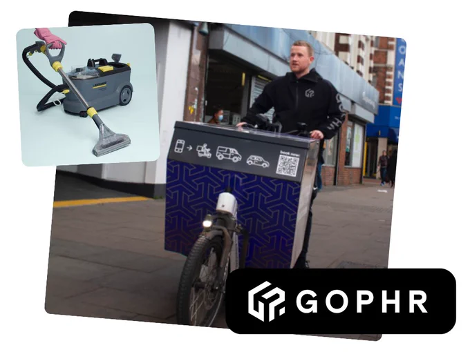 A GOPHR delivery person riding a cargo bike