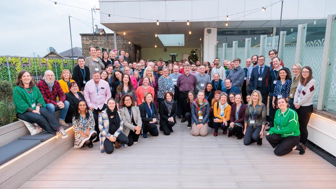 Group photo of all 110 technicians who attended the November 2025 Technician Commitment signatory event