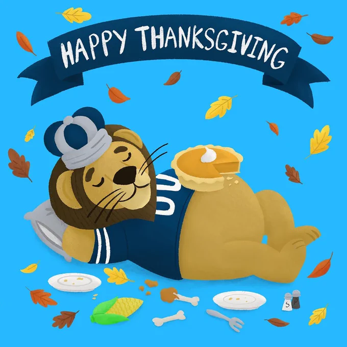 Happy Thanksgiving ribbon text. Big Blue sleeping with pie on belly.